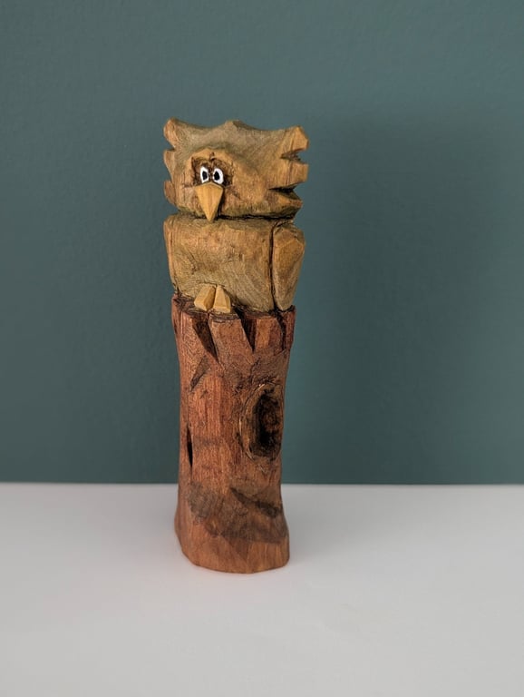 Hand Carved Owl on a Trunk