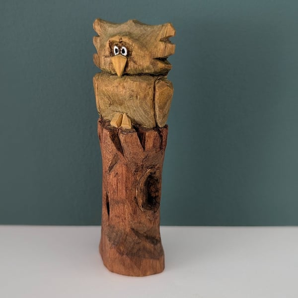Hand Carved Owl on a Trunk