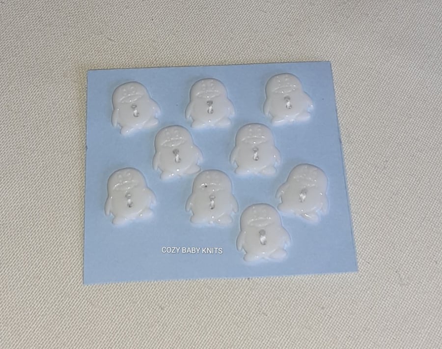 WHITE PENGUIN SHAPED BUTTONS WITH TWO HOLES FOR ATTACHING 
