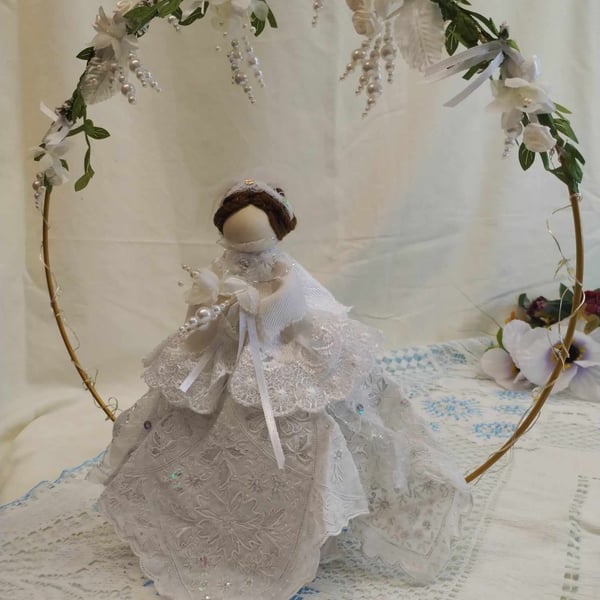 Handmade White Wedding doll sitting on a hoop with fairy lights & Flowers