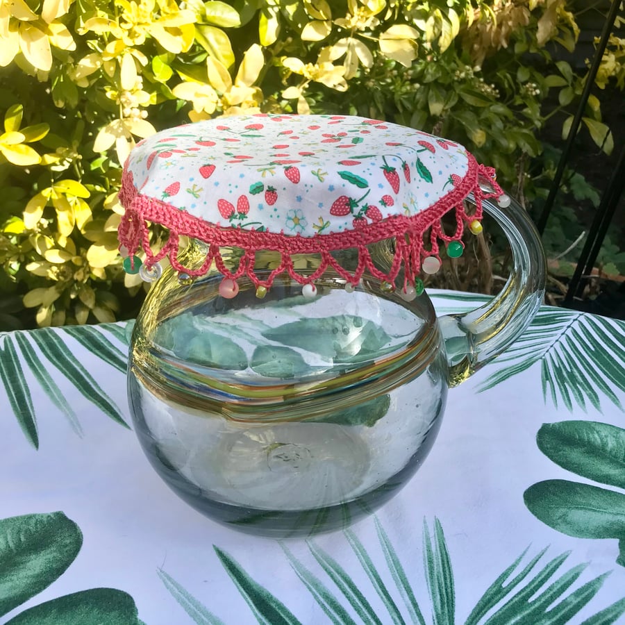 Jug cover, strawberry print fabric bowl cosy, reversible outdoor tableware 