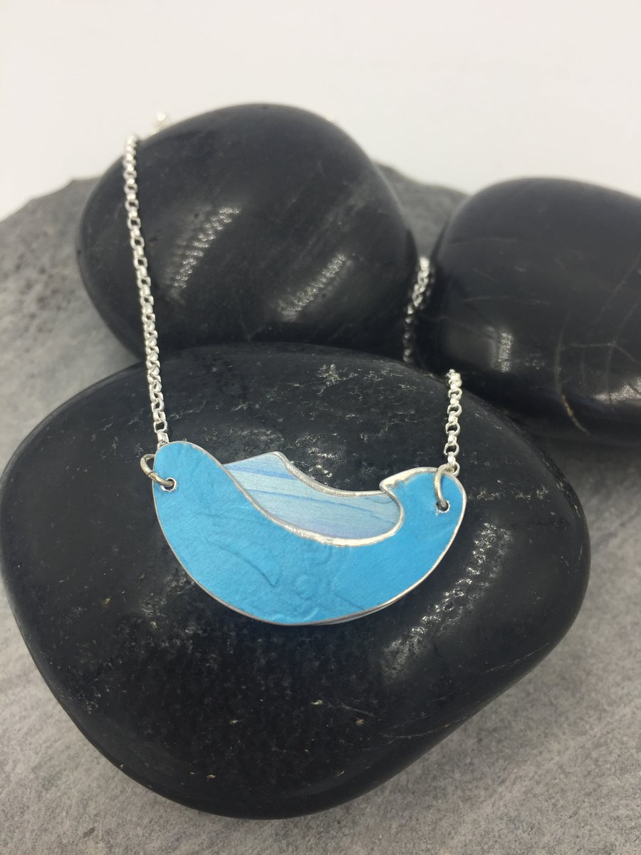 Shades of blue anodised aluminium ocean wave pendant with silver chain