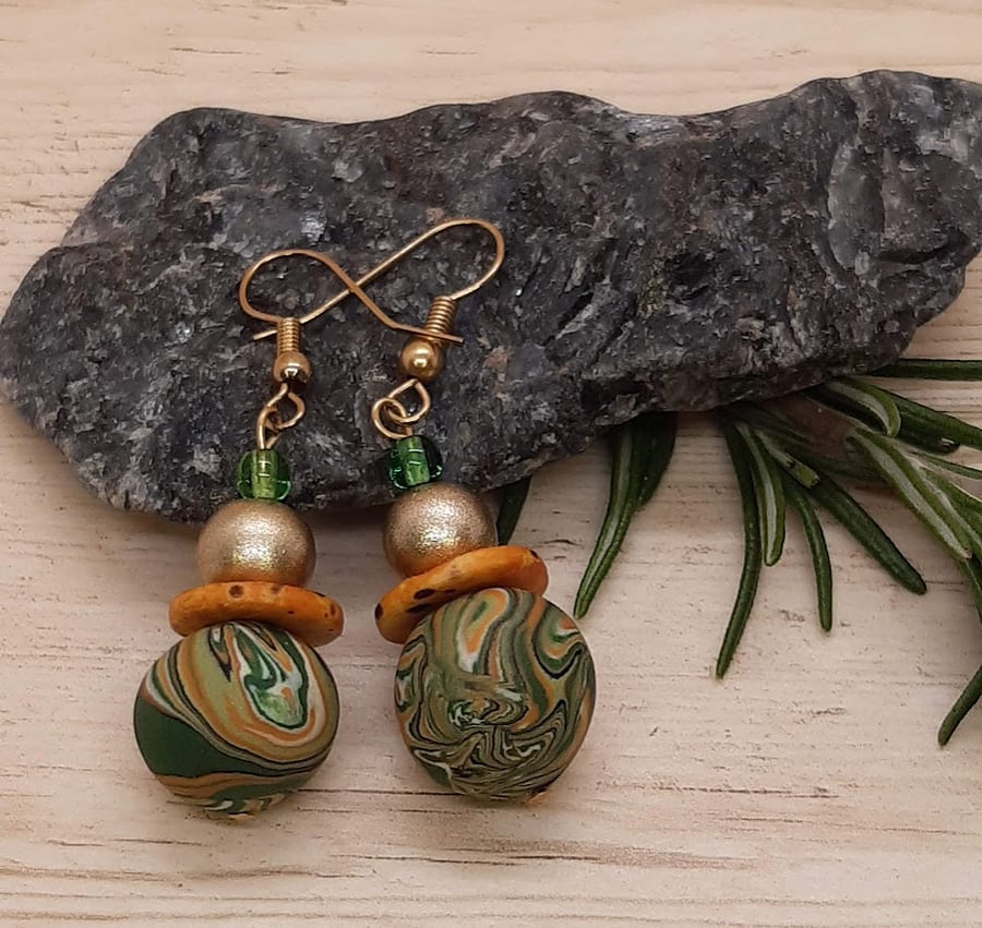 Dangly polymer clay earrings in sage and orange  