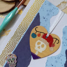 Christmas card with a wooden Christmas skull decoration