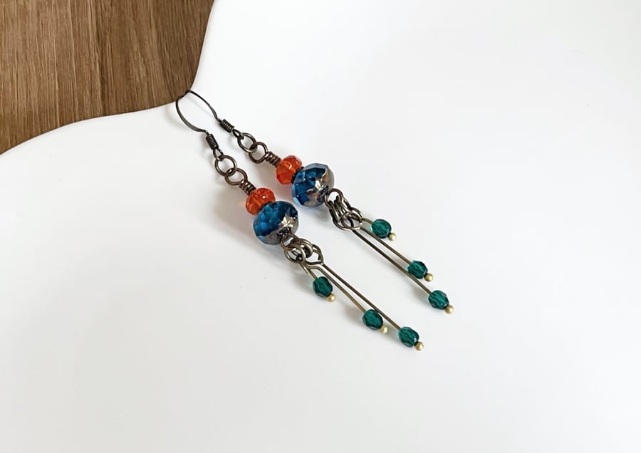 Bohemian style beaded earrings in deep blue and orange