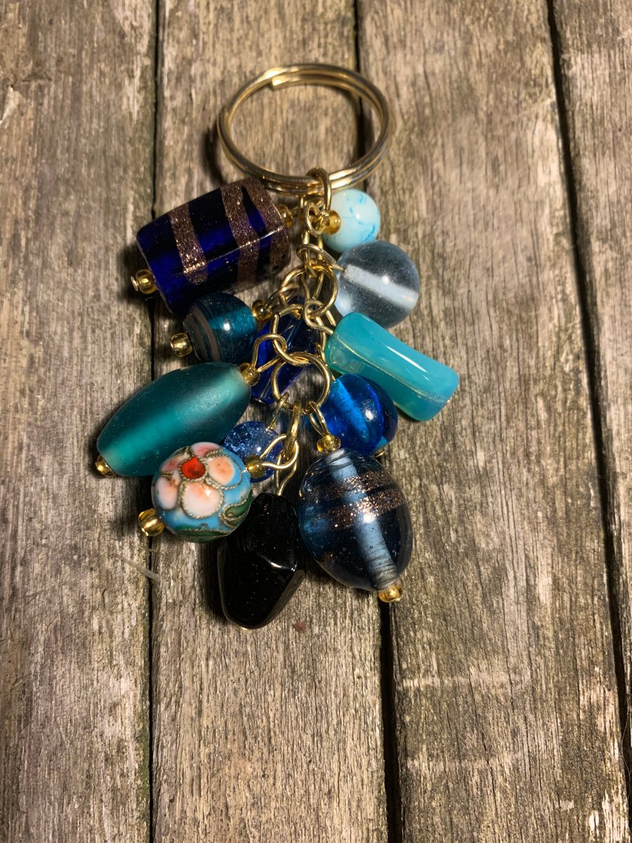Blue glass bead and gold keyring
