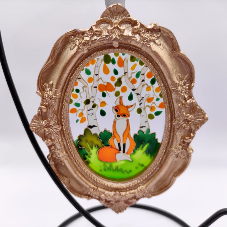 Handmade glass painted window hanging or Christmas tree bauble