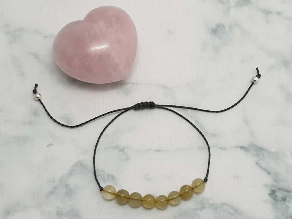 Rutilated Quartz bracelet - Draws off negative energy, letting go of the past