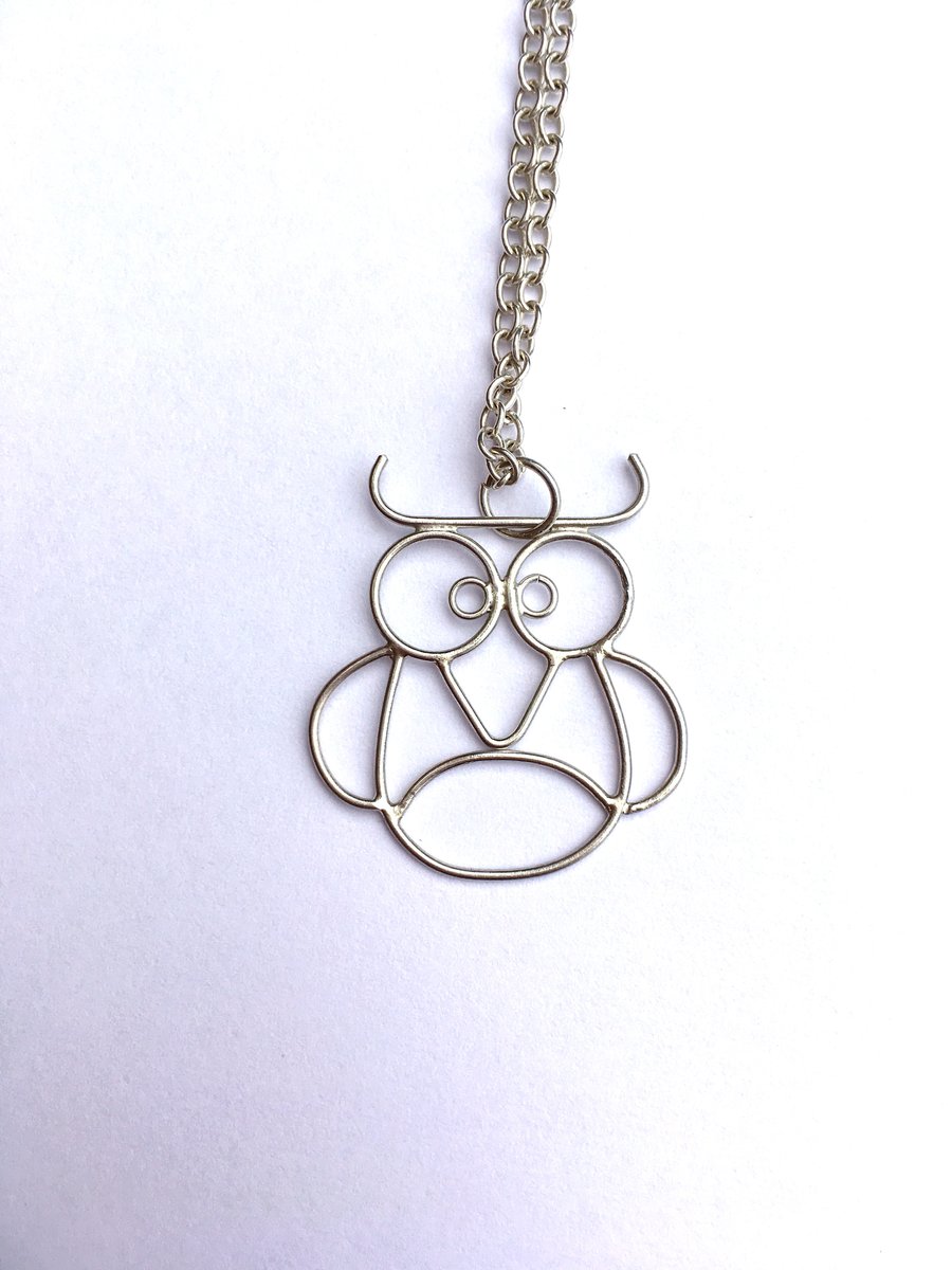 A tiny silver owl pin or necklace. Fast shipping. Great Christmas gift 