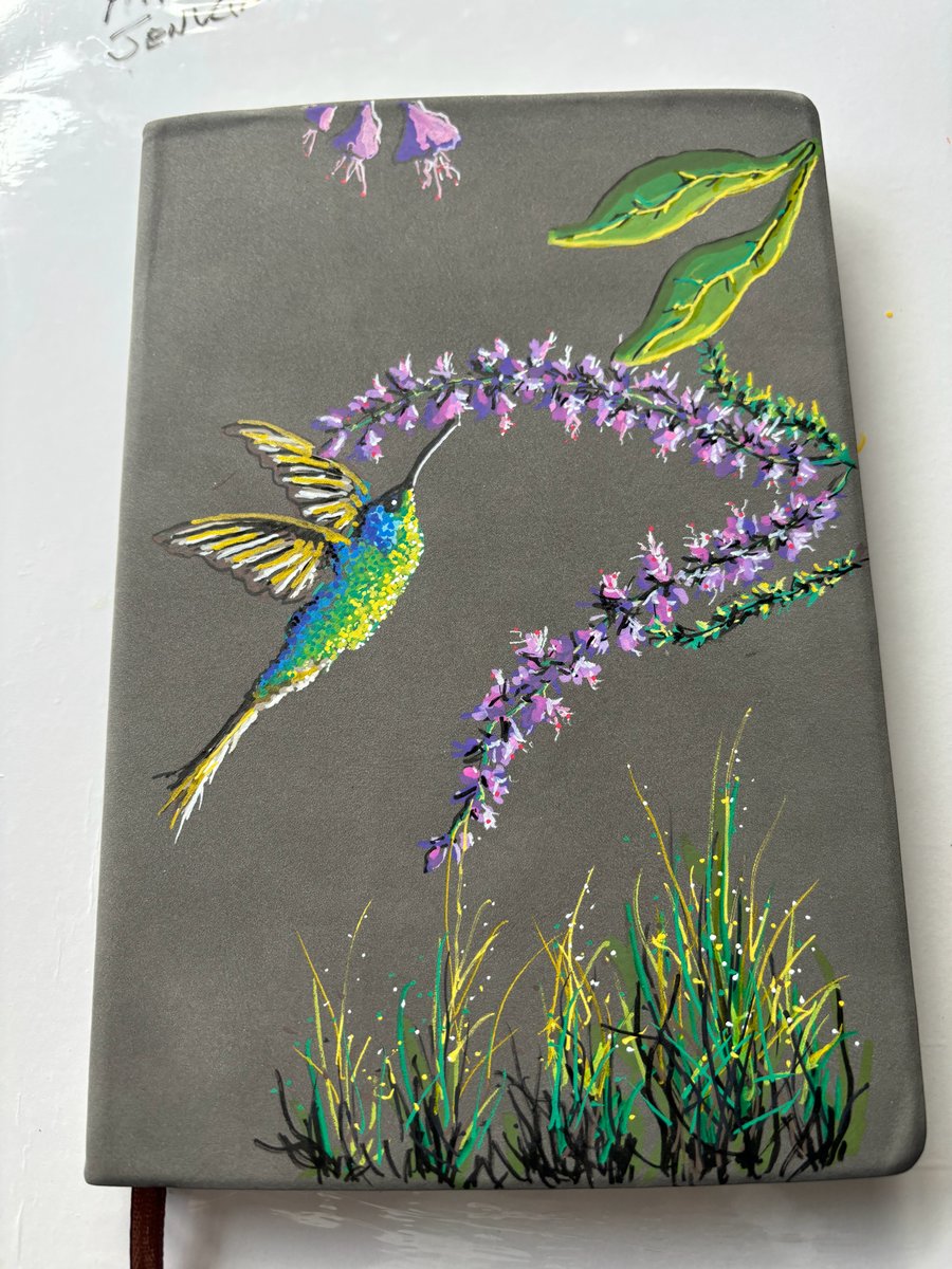 A hand painted and sealed faux leather journal by Andrew Jenkins 