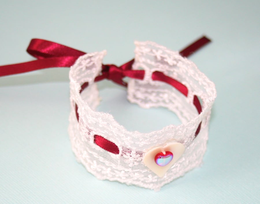 White lace and red ribbon heart cuff bracelet