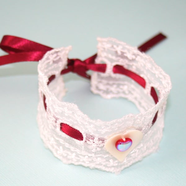 White lace and red ribbon heart cuff bracelet