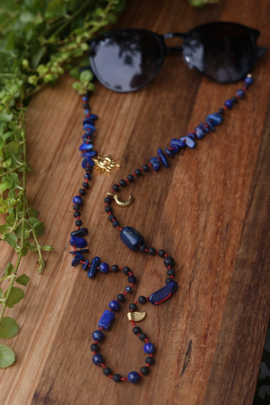 Glasses chain with natural stones lapis lazuli and lava stone