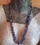 Handmade purple, green and white polymer clay necklace