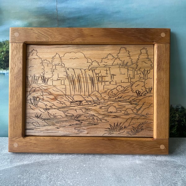 Solid hardwood framed waterfall scene engraving