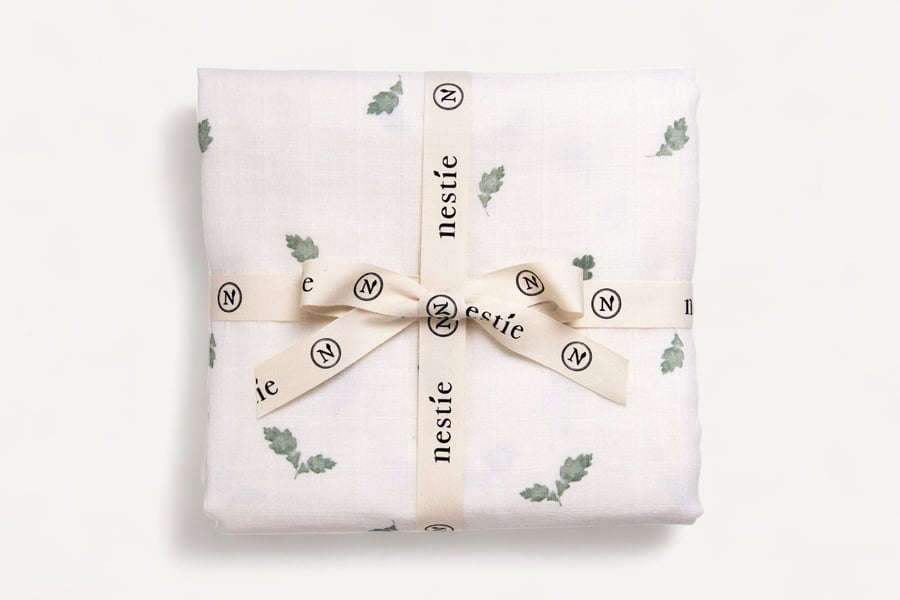 Two Layer Muslin Baby Blanket and Swaddle in our delicate Nestie Woodland Theme.