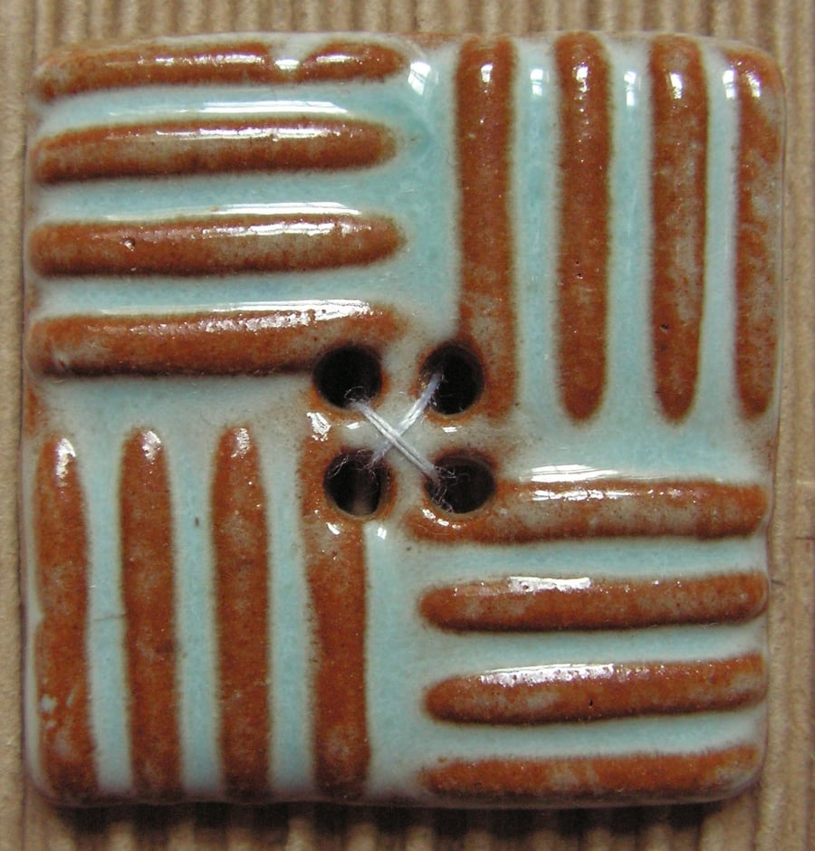 Set of 2 ceramic blue and brown stripy square buttons