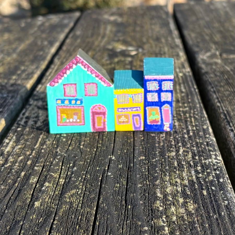 Parade of three little hand painted wooden shops - shelf ornaments