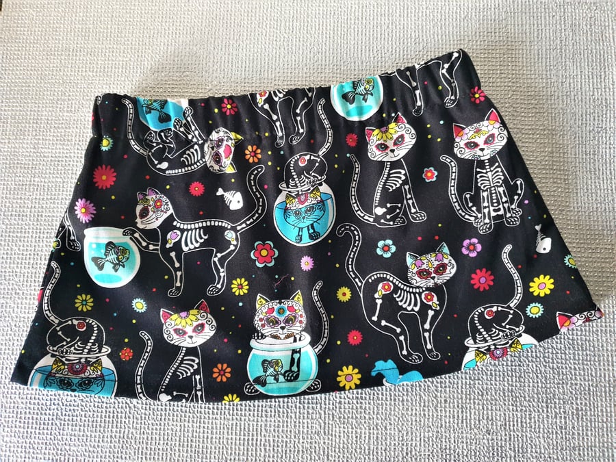 Baby's skirt with fun skeleton cat print