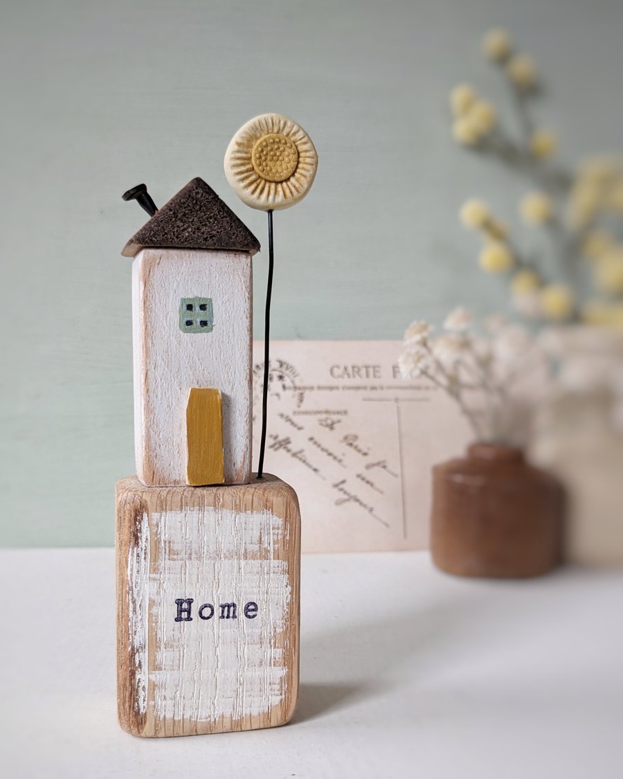 Little Wooden Hut with Clay Sunshine Flower 'Home'