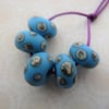 handmade blue and ivory spot lampwork glass beads