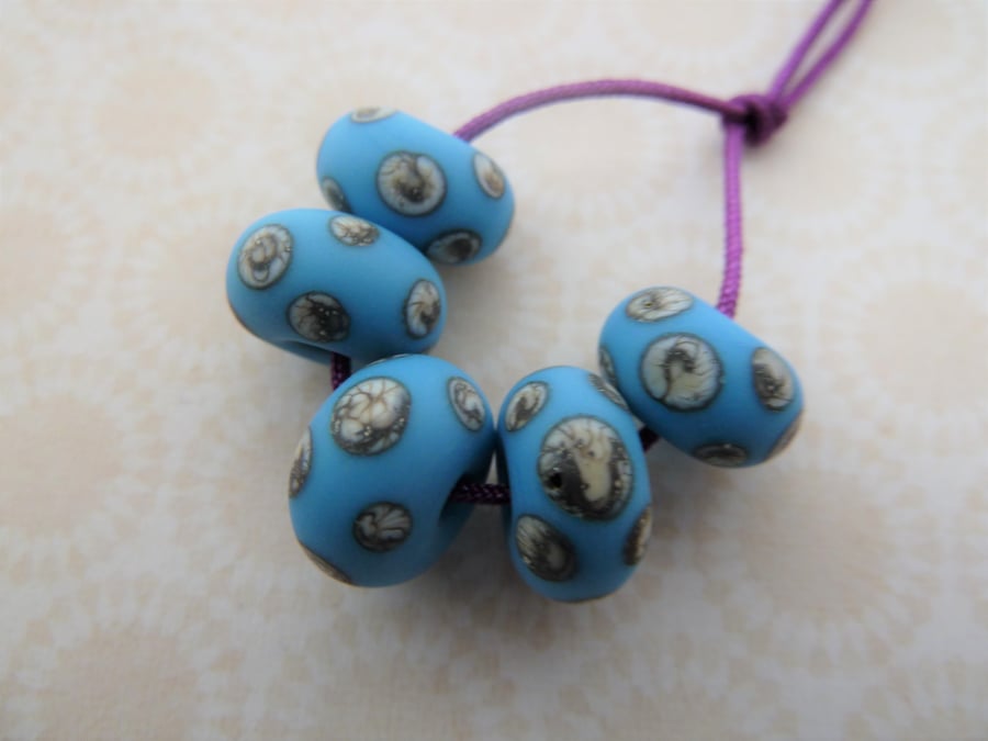 handmade blue and ivory spot lampwork glass beads