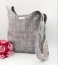Reversible grey and patterned knot bag.  - Image 9