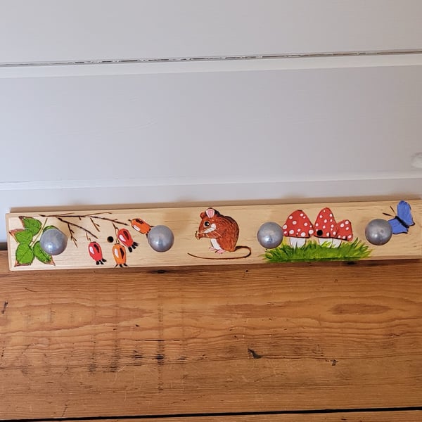 Wooden Coat Hooks Decorated With A Mouse