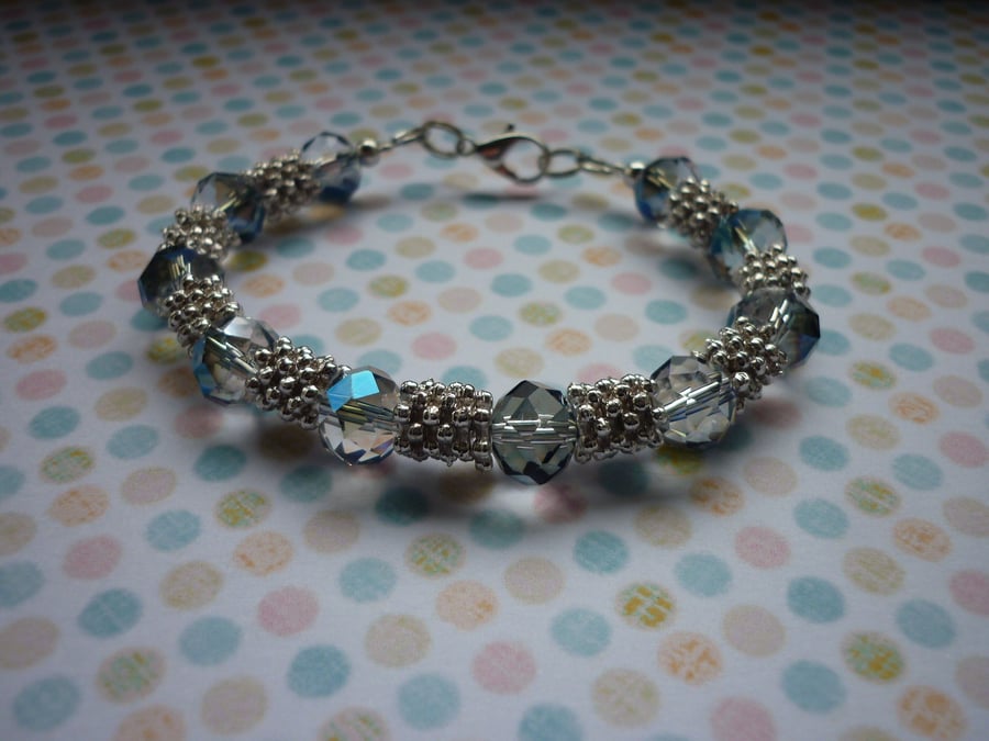 BLUE, AB CRYSTAL AND SILVER BRACELET.