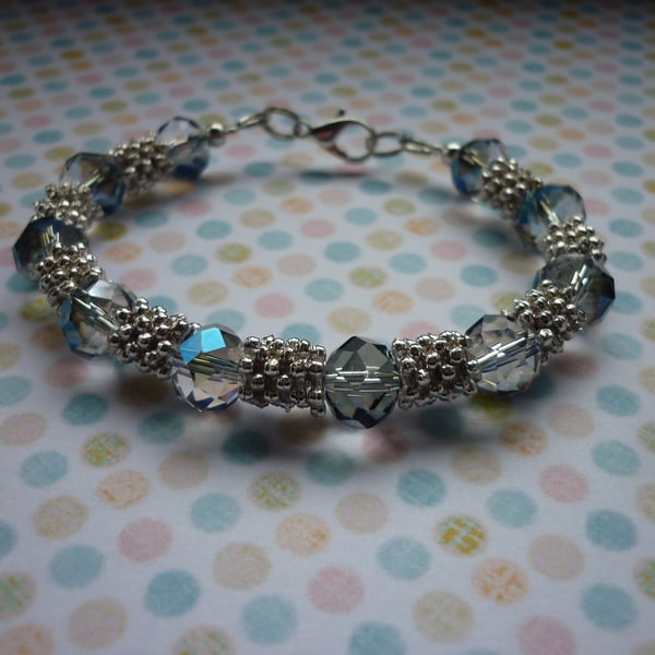 BLUE, AB CRYSTAL AND SILVER BRACELET.