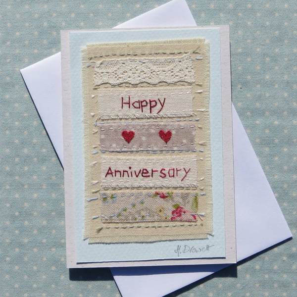 Hand-stitched card full of homespun charm for two special people