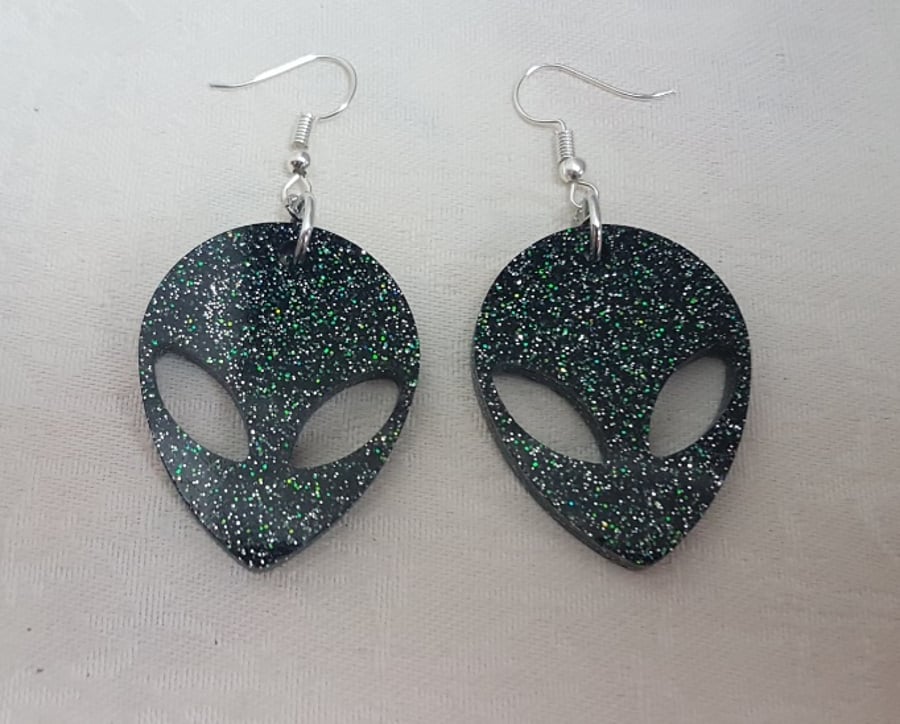 Very Glittery Black Alien Head Earrings.