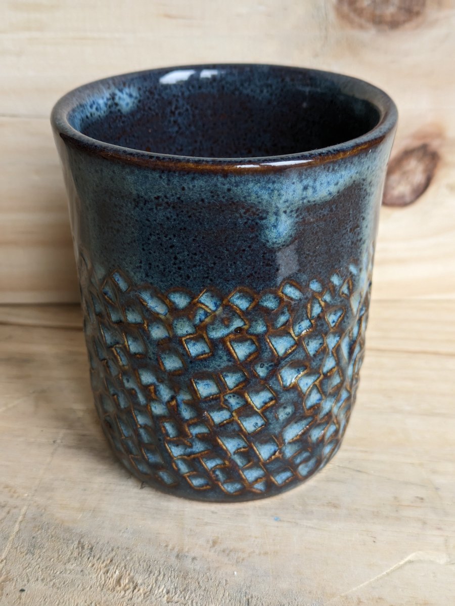 Carved tumbler