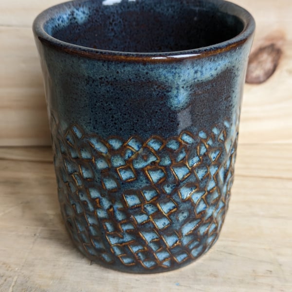 Carved tumbler