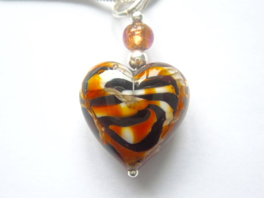 Murano glass tiger's eye brown heart pendant with sterling silver.