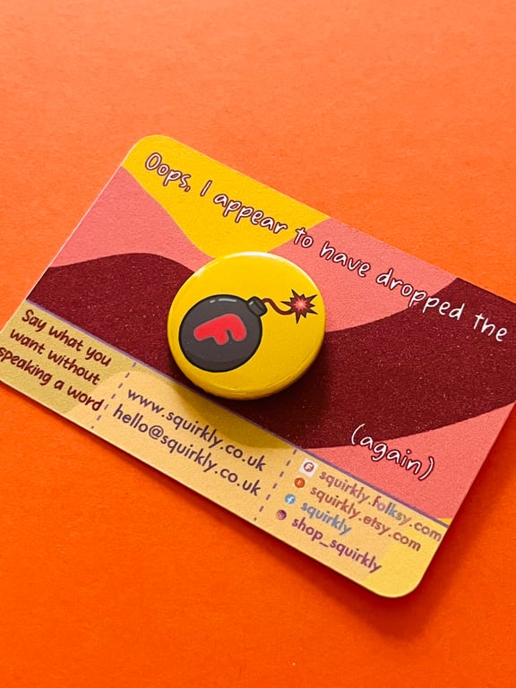 F-bomb, pin badge, pocket pebble or magnet. Teach