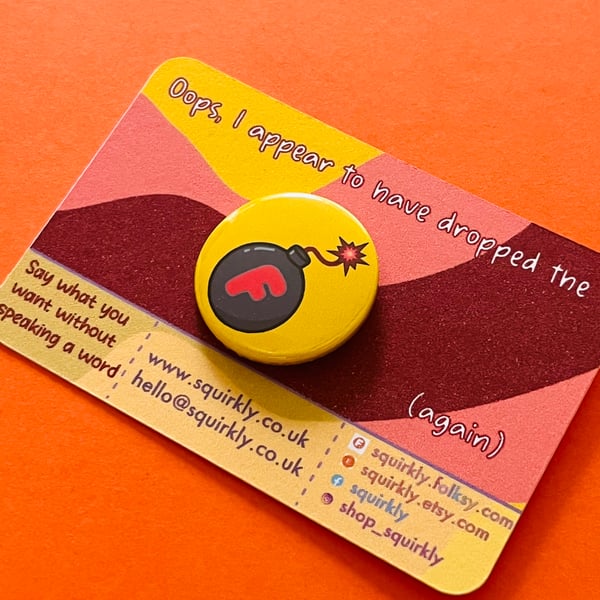 F-bomb, pin badge, pocket pebble or magnet. Teach