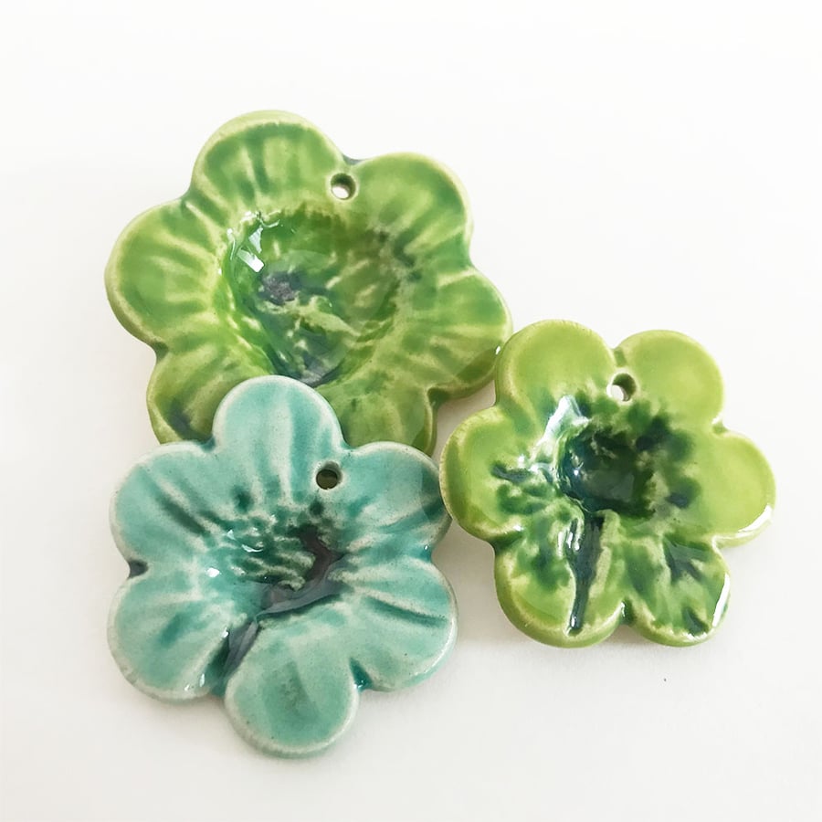 Sale Set of three handmade ceramic flower pendants