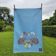 Hedgehogs in primroses heart tea towel design, organic cotton, hanging loop