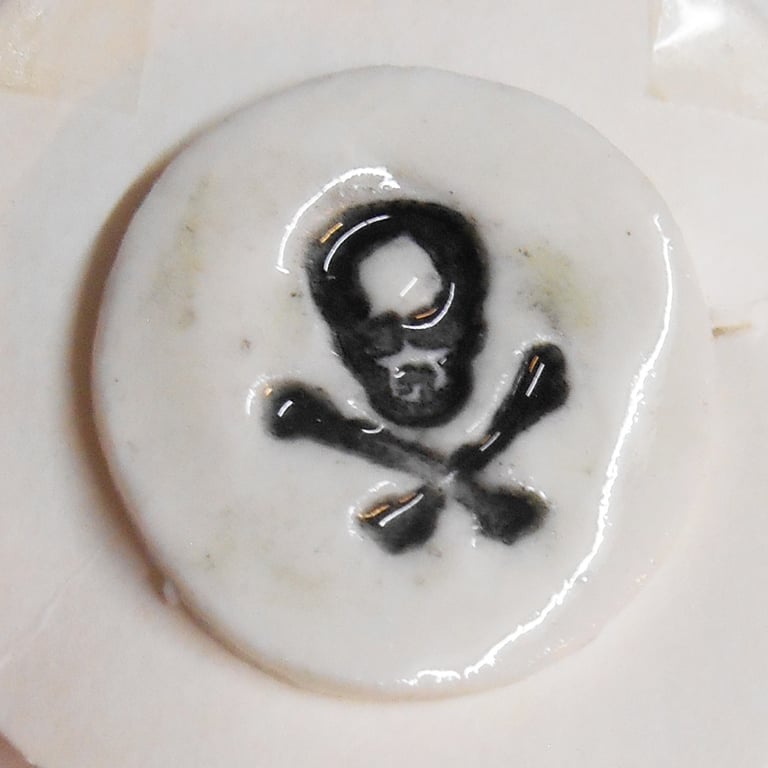 Ceramic Buttons  small Skull and x bones Round Badge