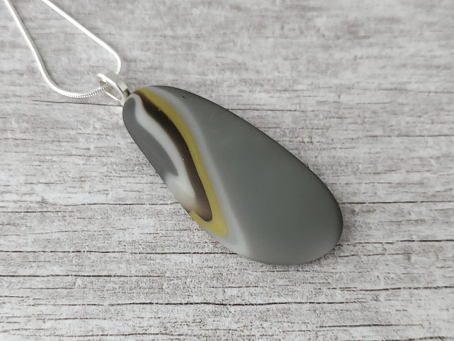 Fused glass pendant, grey and yellow pebble series 5