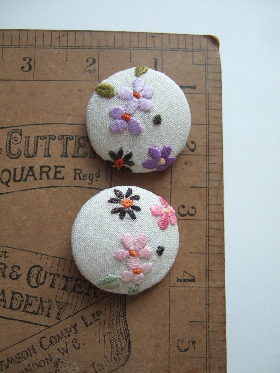 A pair of extra large buttons covered in vintage embroidery. Mothers' Day gift.