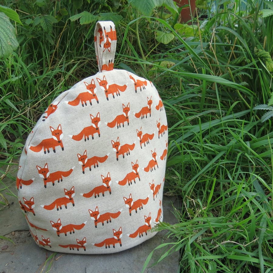Foxes.  A medium sized tea cosy.  To fit a 3 - 4 cup teapot.
