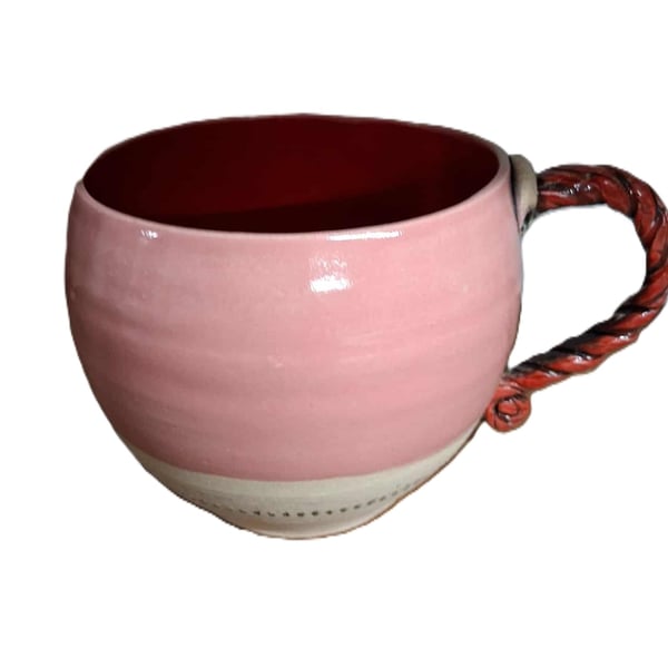 Ceramic wheel thrown Red and Pink Round mug with Twisted Handles.