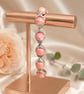Rhodochrosite stretchy beaded bracelet with silver colured connectors - Image 3