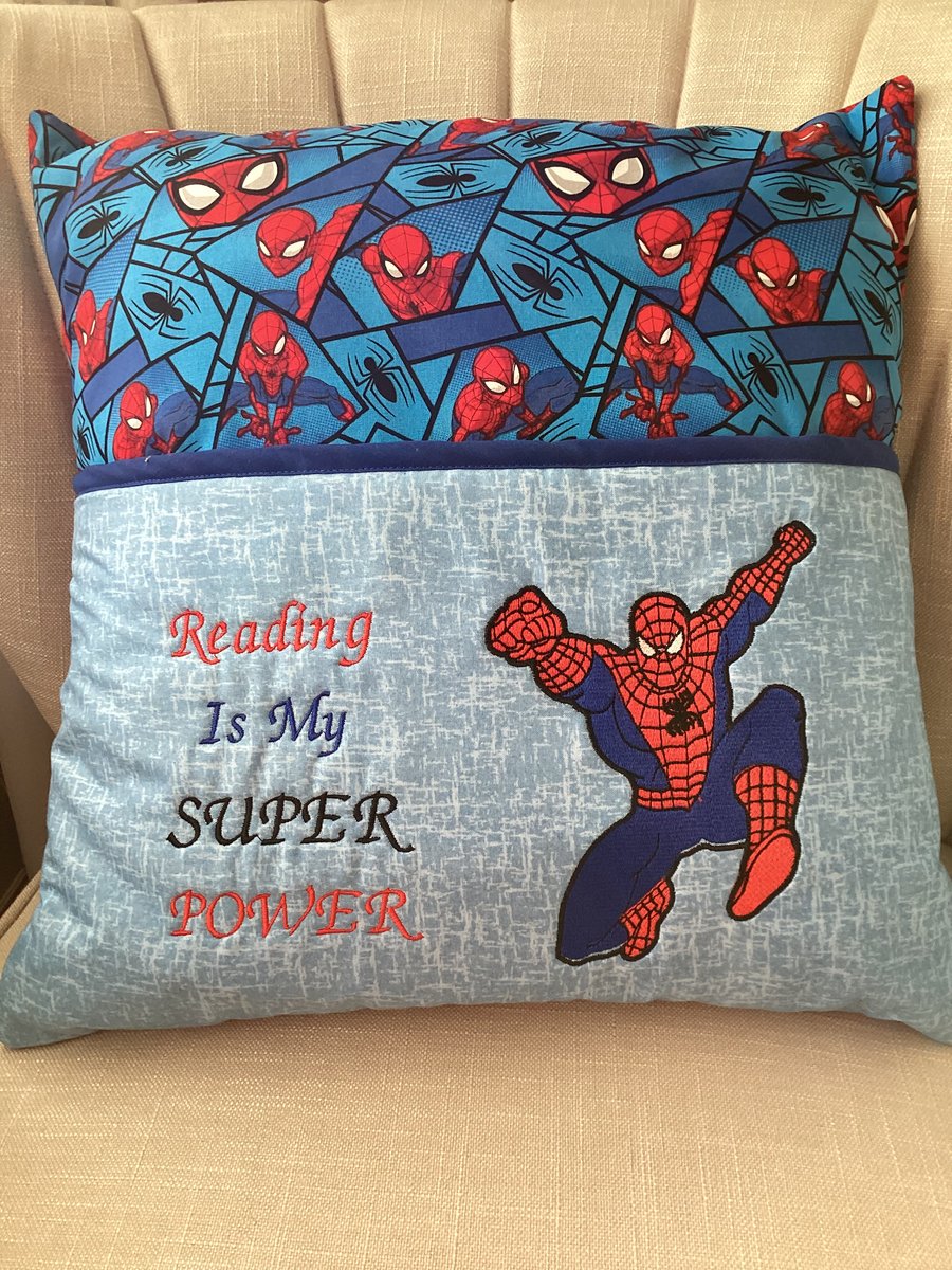 Spider-Man reading book cushion 