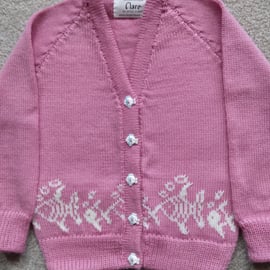 Child's cardigan with fish round the bottom and hand painted fish buttons