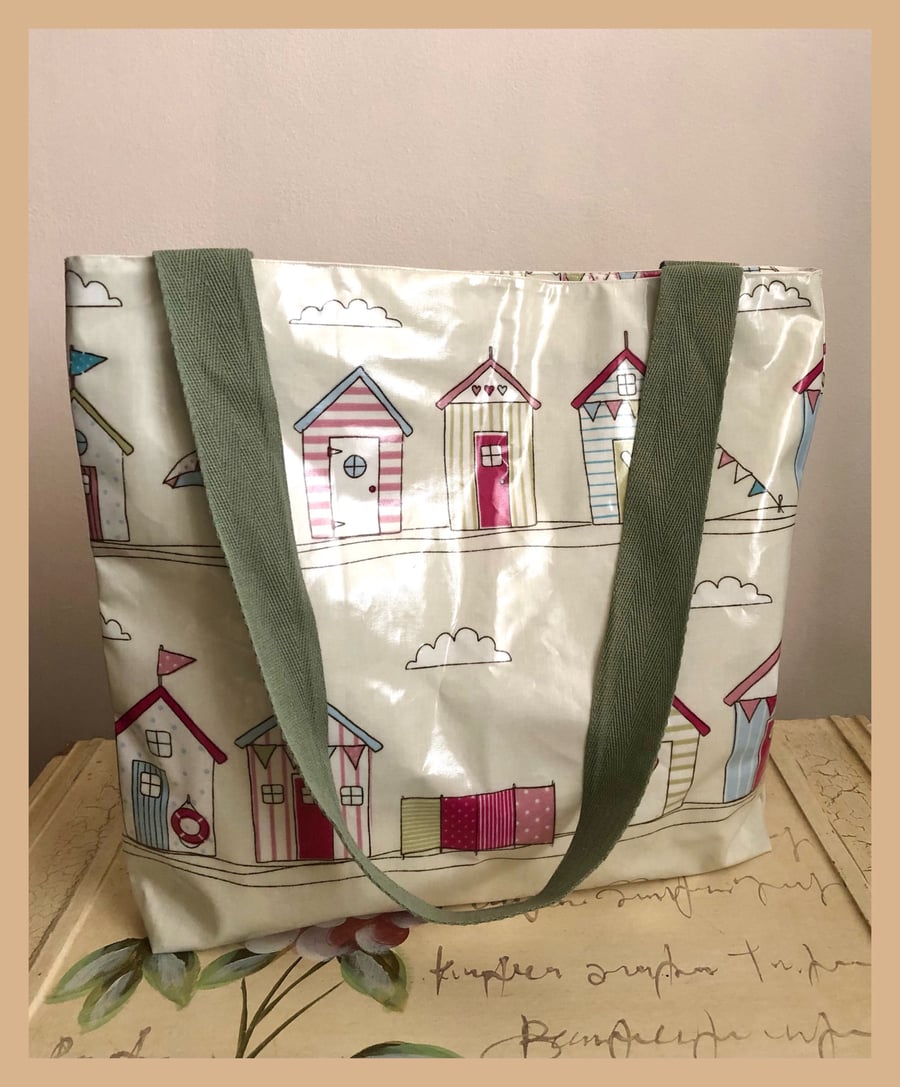 Oilcloth tote bag with recessed zip in Beach Hut design