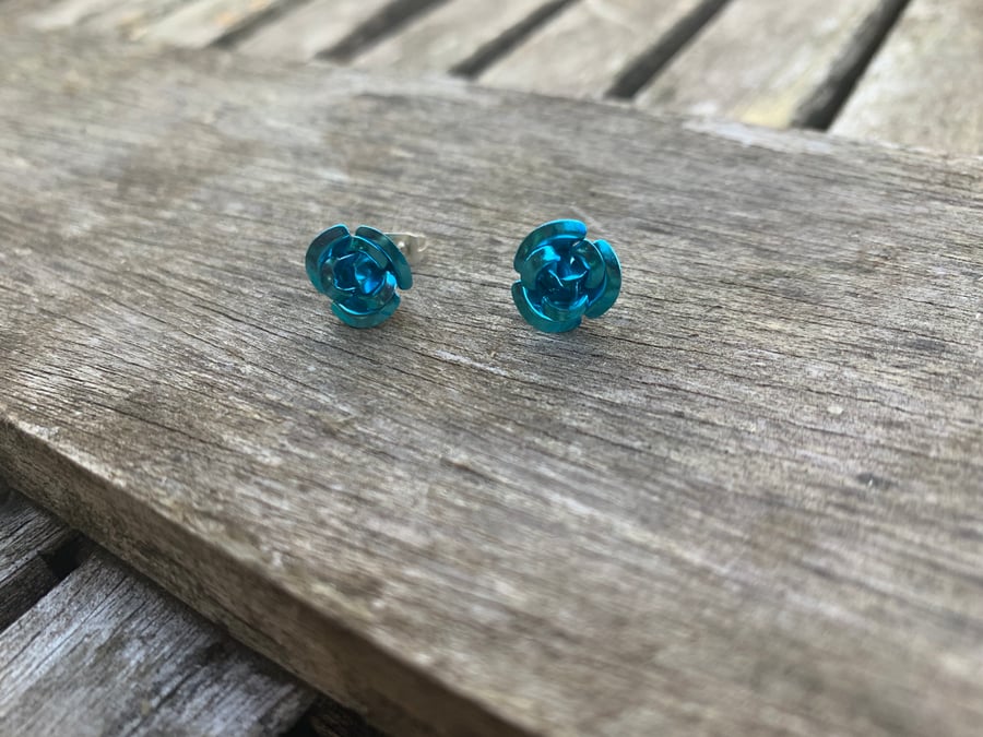 Blue metal rose studs