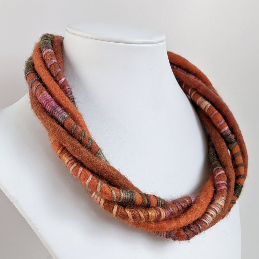 The Wrapped Twist: felted cord necklace in deep oranges